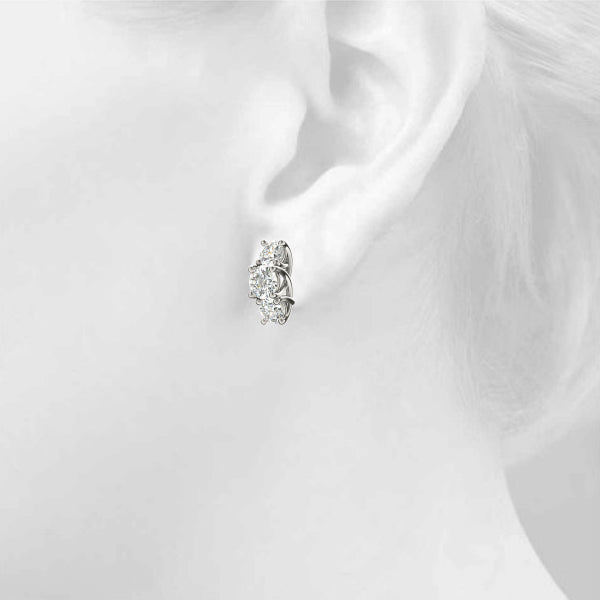 Round Three-Stone Diamond Earrings · 5.02 ct tw