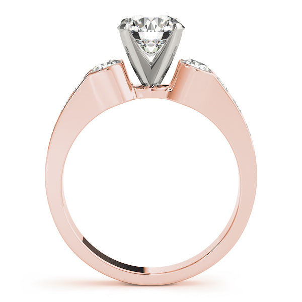 Round Three-Stone Diamond Engagement Ring · 0.54 ct tw