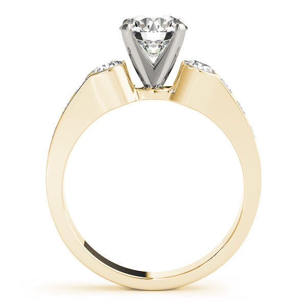 Round Three-Stone Diamond Engagement Ring · 0.54 ct tw