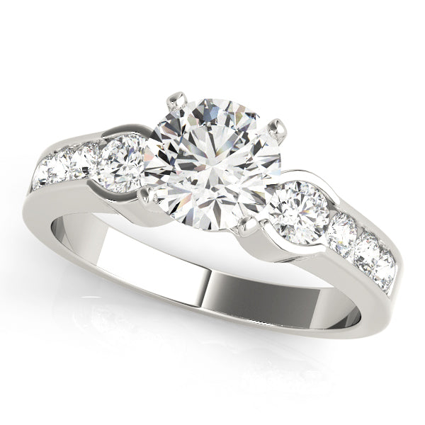 Round Three-Stone Diamond Engagement Ring · 0.54 ct tw