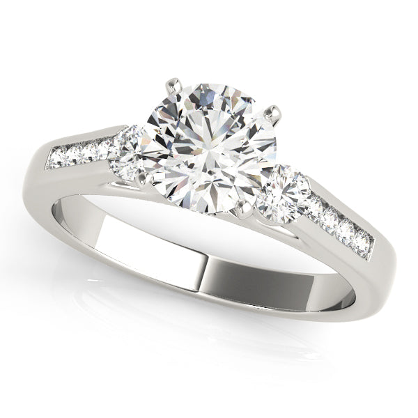 Round Three-Stone Diamond Engagement Ring · 0.44 ct tw