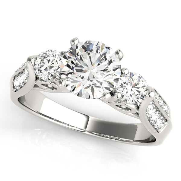 Round Three-Stone Diamond Engagement Ring · 0.65 ct tw