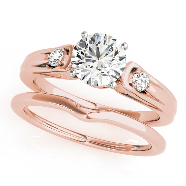 Round Three-Stone Diamond Engagement Ring · 0.10 ct tw