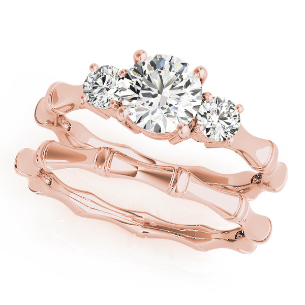Round Three-Stone Diamond Engagement Ring · 0.99 ct tw