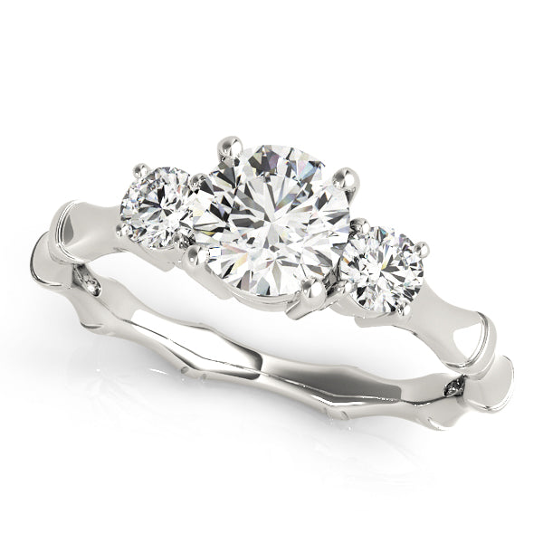 Round Three-Stone Diamond Engagement Ring · 1.09 ct tw