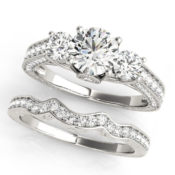Round Three-Stone Diamond Engagement Ring · 2.29 ct tw