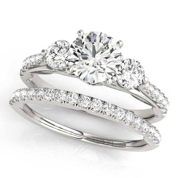 Round Three-Stone Diamond Engagement Ring · 0.61 ct tw