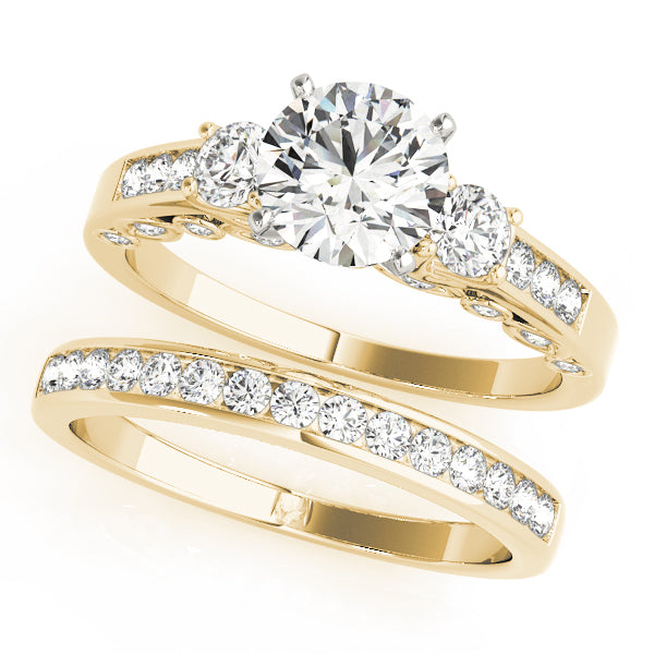 Round Three-Stone Diamond Engagement Ring · 0.44 ct tw