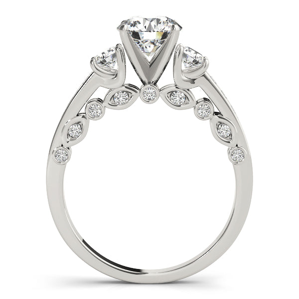 Round Three-Stone Diamond Engagement Ring · 0.44 ct tw