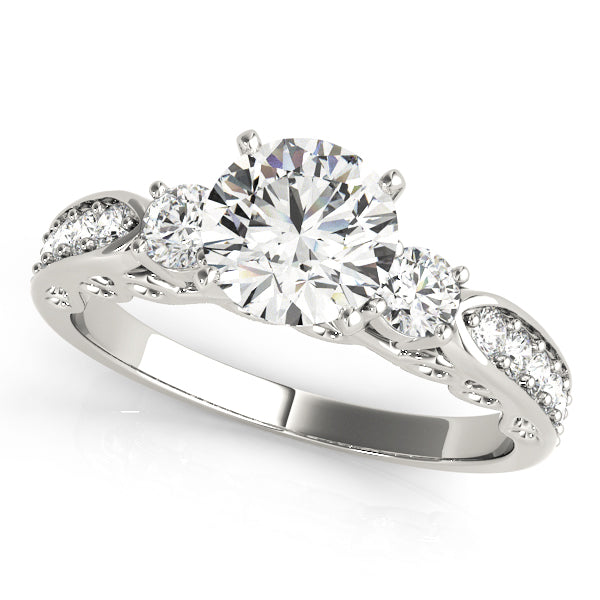 Round Three-Stone Diamond Engagement Ring · 0.46 ct tw
