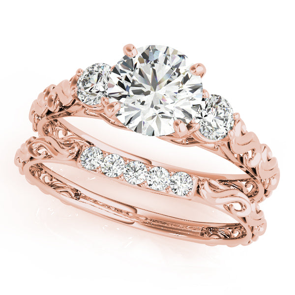 Round Three-Stone Diamond Engagement Ring · 0.24 ct tw