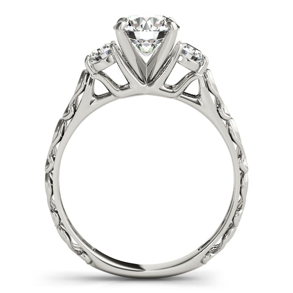 Round Three-Stone Diamond Engagement Ring · 0.24 ct tw