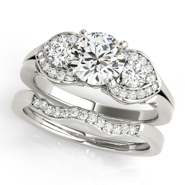 Round Three-Stone Diamond Engagement Ring · 0.36 ct tw