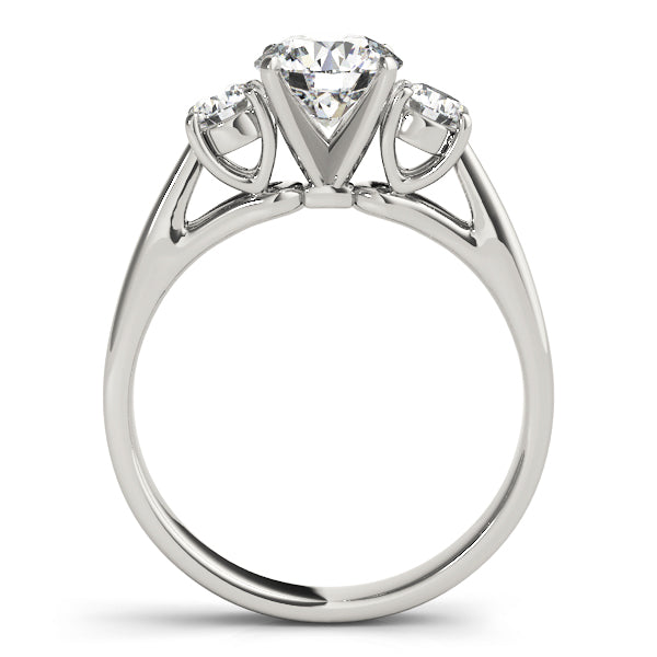 Round Three-Stone Diamond Engagement Ring · 0.70 ct tw
