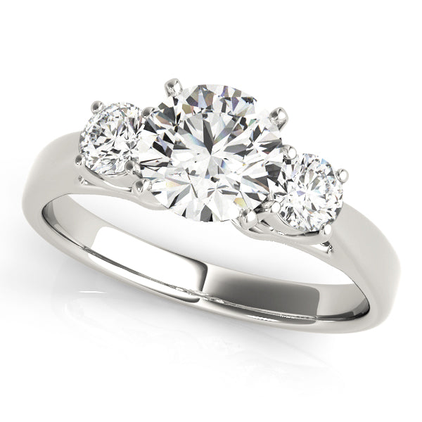 Round Three-Stone Diamond Engagement Ring · 0.70 ct tw