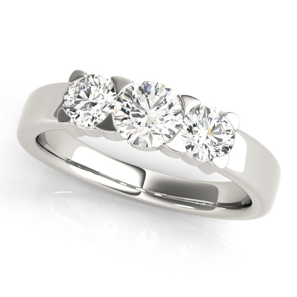 Round Three-Stone Diamond Engagement Ring · 0.49 ct tw