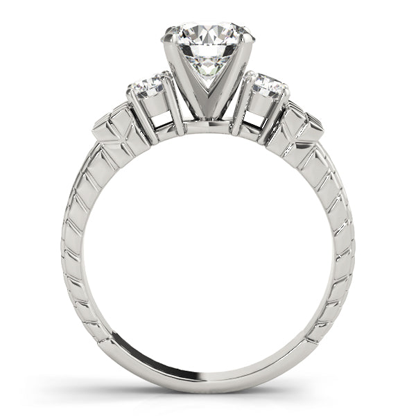 Round Three-Stone Diamond Engagement Ring · 0.30 ct tw