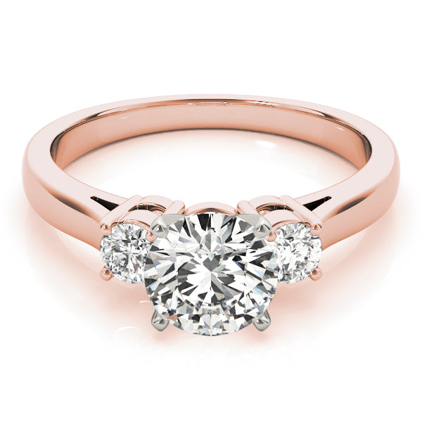 Round Three-Stone Diamond Engagement Ring · 0.14 ct tw