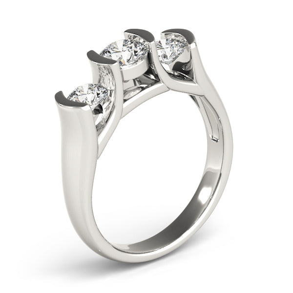 Round Three-Stone Diamond Engagement Ring · 0.49 ct tw
