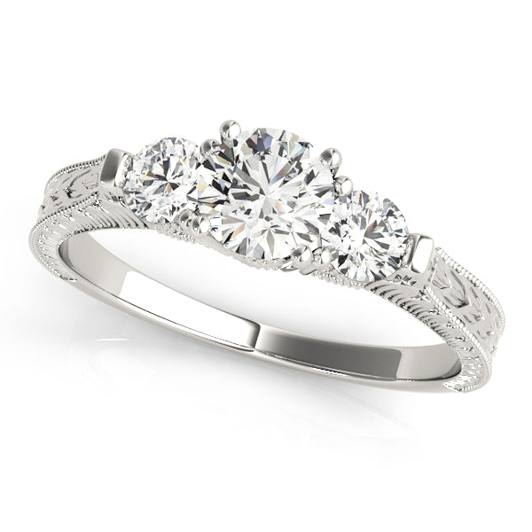 Round Three-Stone Diamond Engagement Ring · 0.82 ct tw