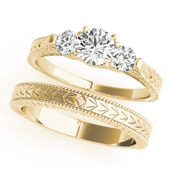 Round Three-Stone Diamond Engagement Ring · 0.82 ct tw