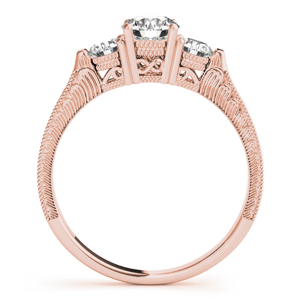 Round Three-Stone Diamond Engagement Ring · 1.33 ct tw