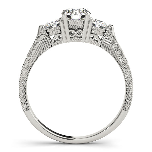 Round Three-Stone Diamond Engagement Ring · 0.82 ct tw