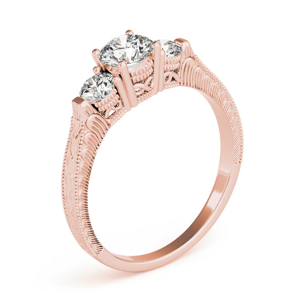 Round Three-Stone Diamond Engagement Ring · 1.33 ct tw