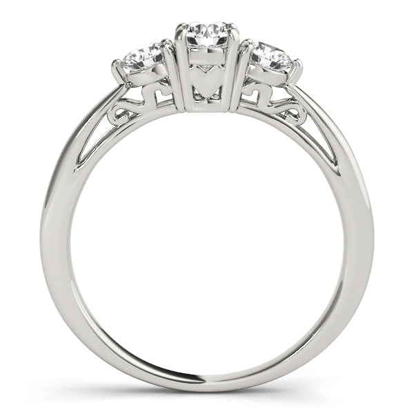 Round Three-Stone Diamond Engagement Ring · 0.74 ct tw