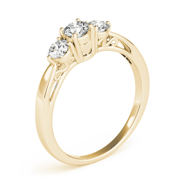 Round Three-Stone Diamond Engagement Ring · 0.74 ct tw