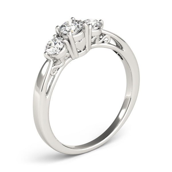 Round Three-Stone Diamond Engagement Ring · 0.74 ct tw