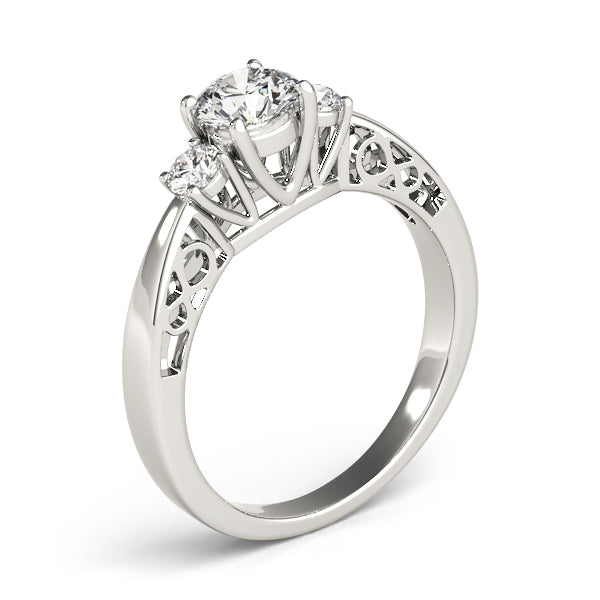 Round Three-Stone Diamond Engagement Ring · 0.70 ct tw