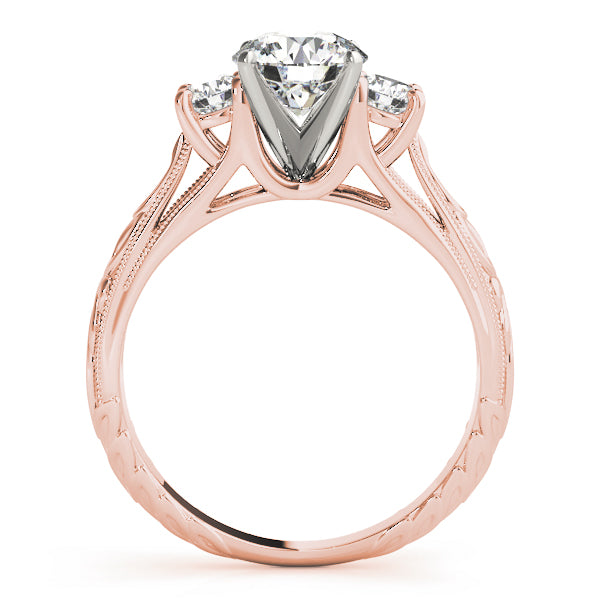Round Three-Stone Diamond Engagement Ring · 0.30 ct tw