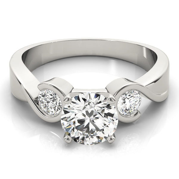 Round Three-Stone Diamond Engagement Ring · 0.24 ct tw