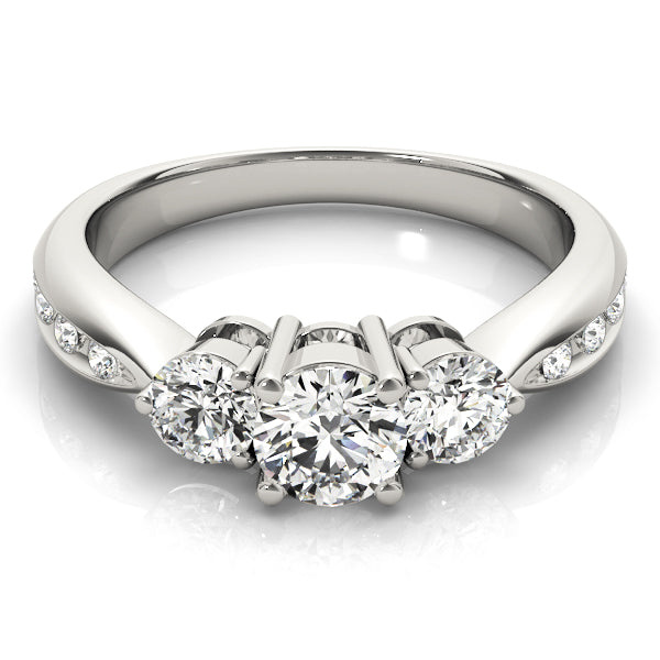 Round Three-Stone Diamond Engagement Ring · 0.79 ct tw