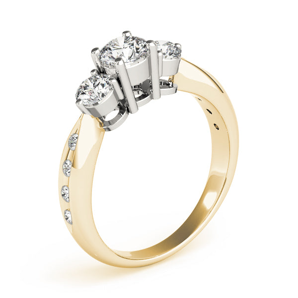Round Three-Stone Diamond Engagement Ring · 0.79 ct tw