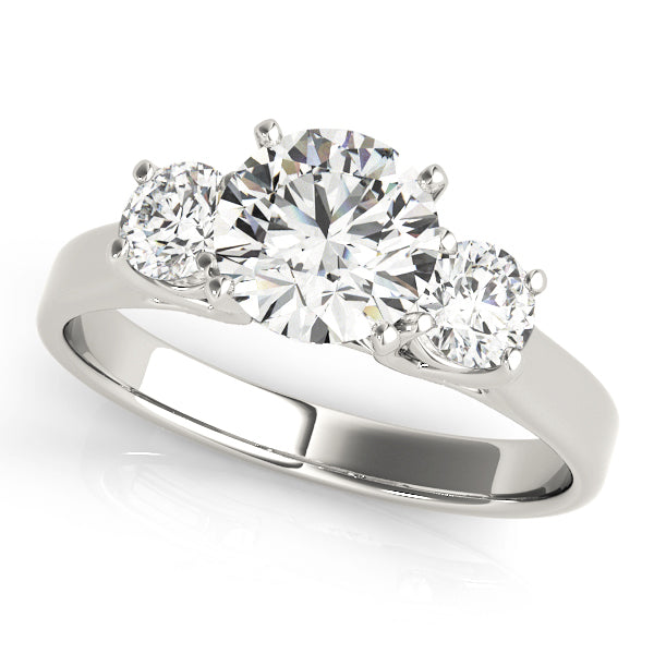 Round Three-Stone Diamond Engagement Ring · 0.14 ct tw