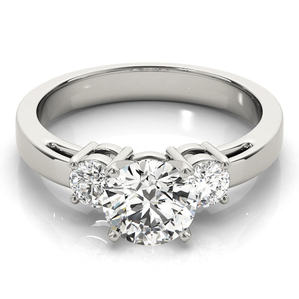 Round Three-Stone Diamond Engagement Ring · 0.40 ct tw