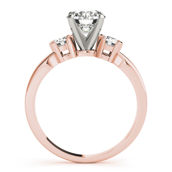 Round Three-Stone Diamond Engagement Ring · 0.24 ct tw