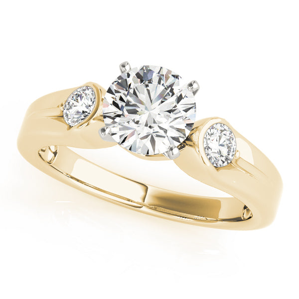 Round Three-Stone Diamond Engagement Ring · 0.20 ct tw