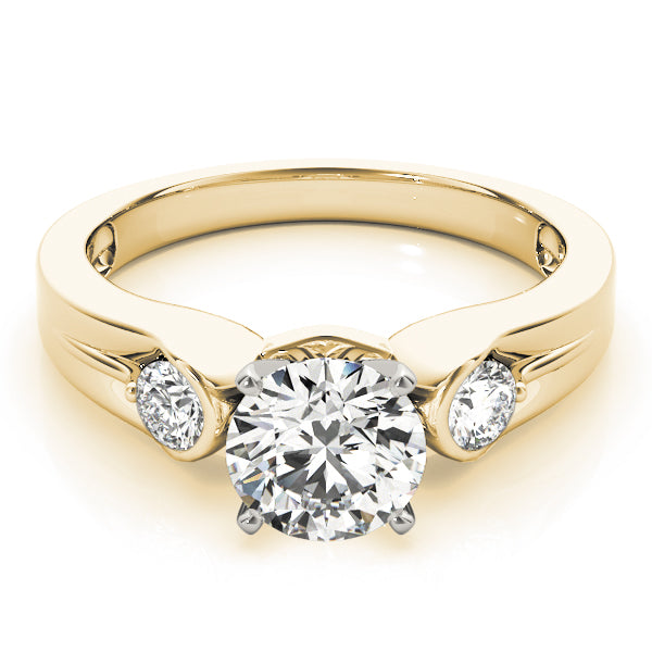 Round Three-Stone Diamond Engagement Ring · 0.20 ct tw