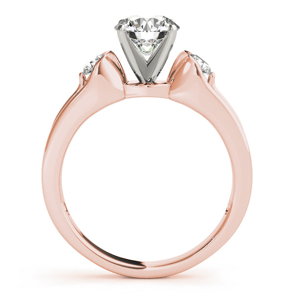 Round Three-Stone Diamond Engagement Ring · 0.20 ct tw