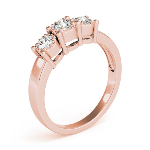 Round Three-Stone Diamond Engagement Ring · 0.24 ct tw