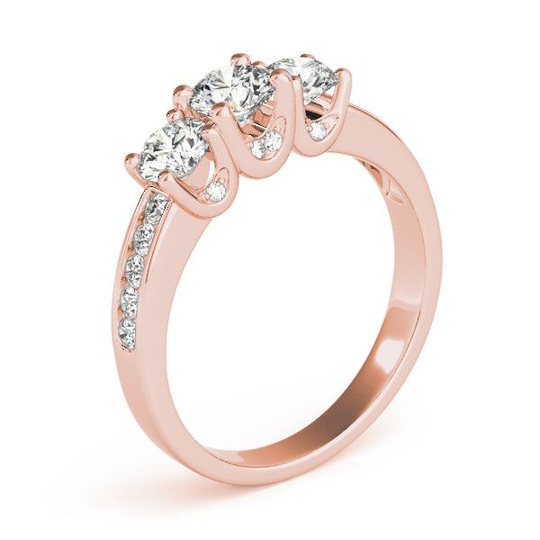 Round Three-Stone Diamond Engagement Ring · 0.49 ct tw