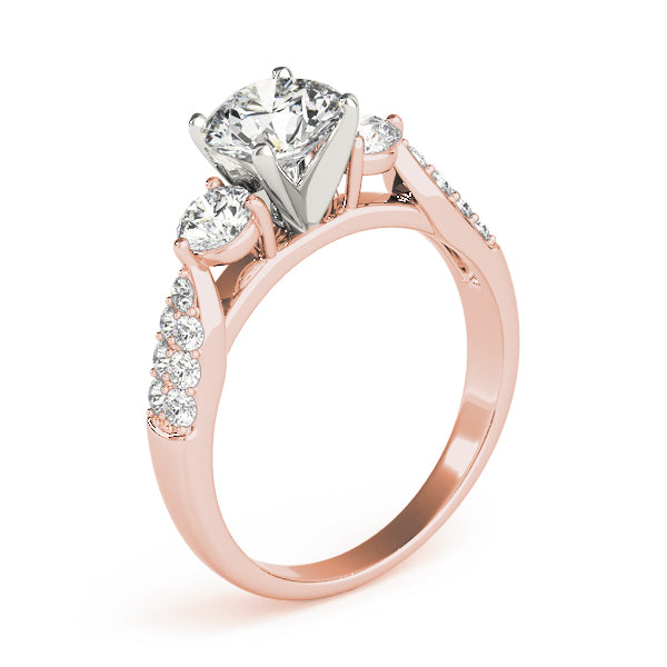 Round Three-Stone Diamond Engagement Ring · 0.51 ct tw