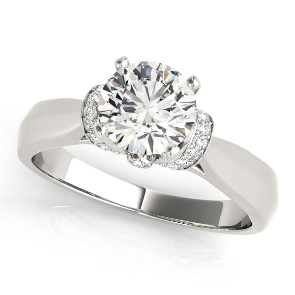 Diamond Solitaire Engagement Ring · 0.12 ct tw