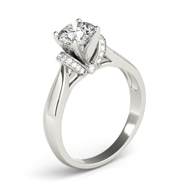 Diamond Solitaire Engagement Ring · 0.12 ct tw