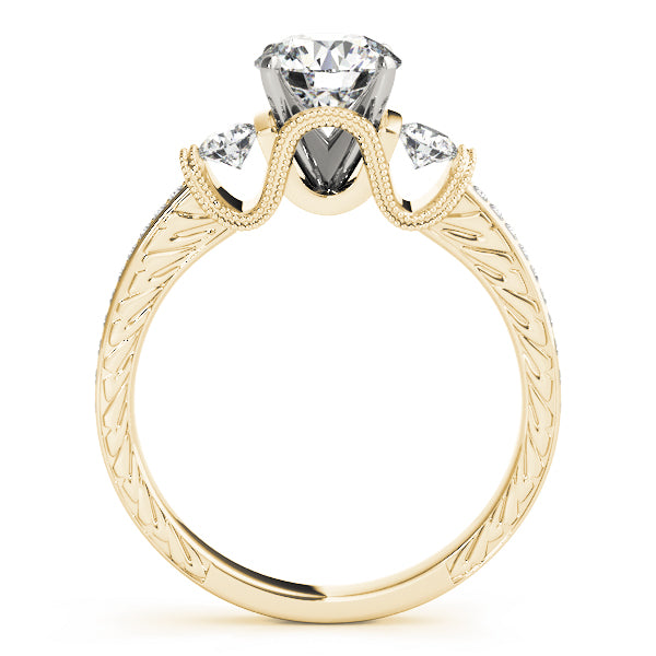 Round Three-Stone Diamond Engagement Ring · 0.32 ct tw