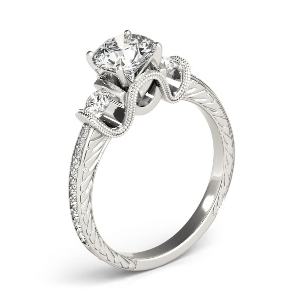 Round Three-Stone Diamond Engagement Ring · 0.34 ct tw