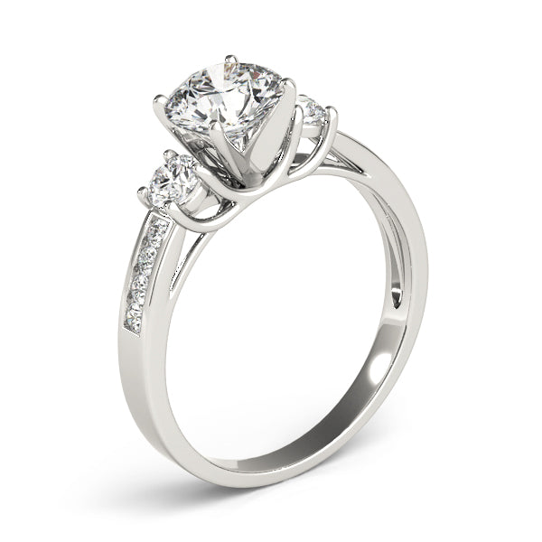 Round Three-Stone Diamond Engagement Ring · 0.38 ct tw